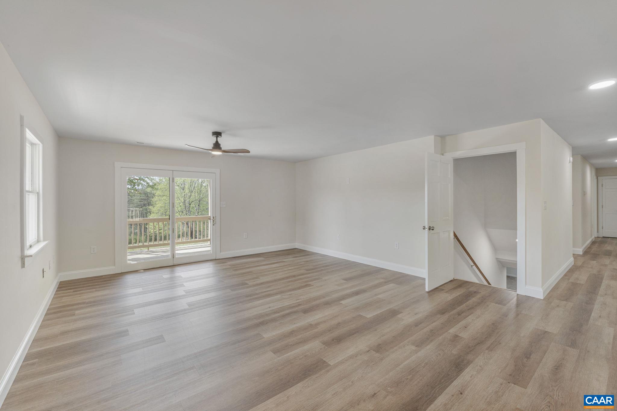 115 Montview Drive Ruckersville, VA 22968 - Photo 19 of 55 a view of an empty room with wooden floor and a window