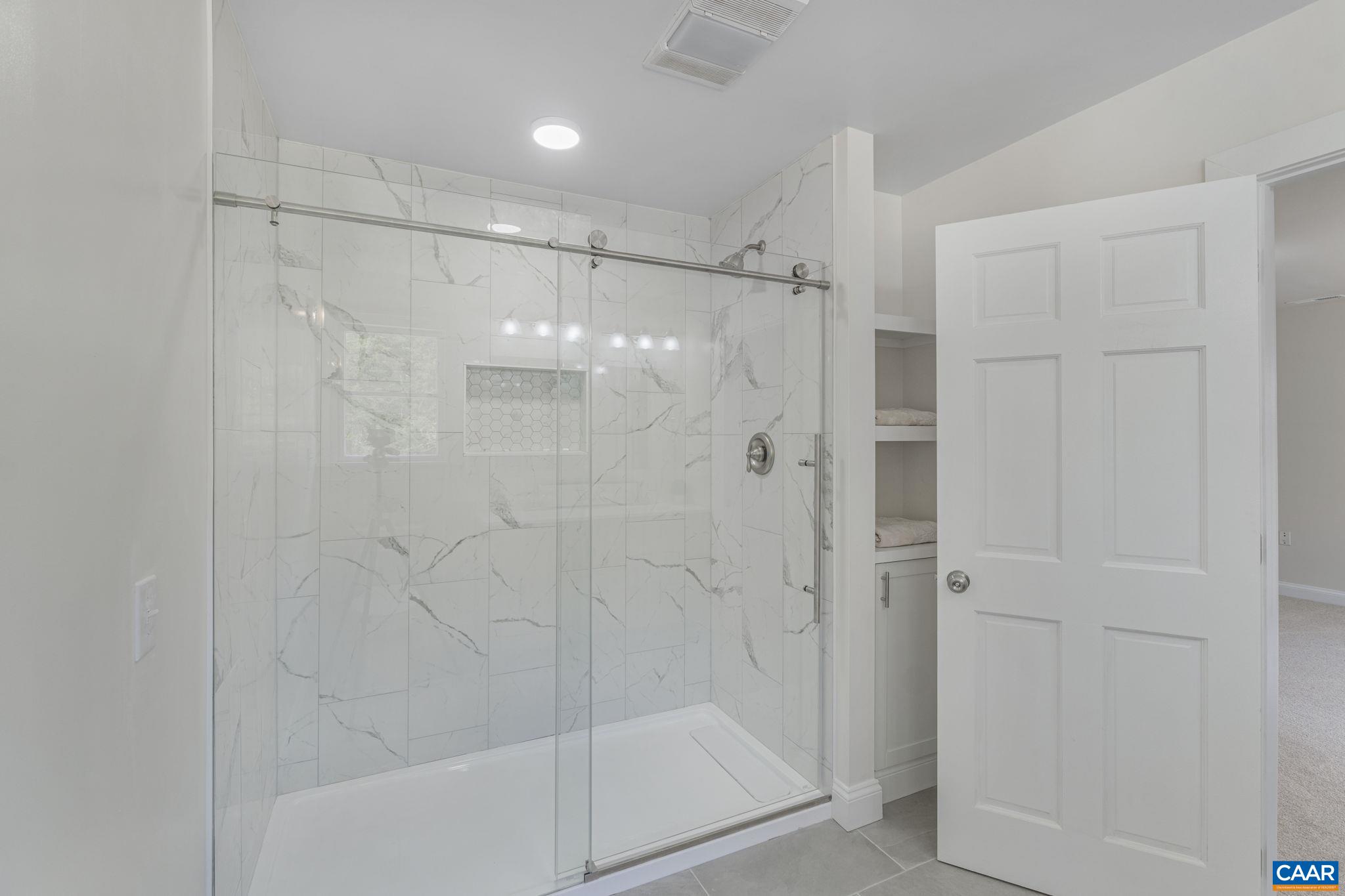 115 Montview Drive Ruckersville, VA 22968 - Photo 25 of 55 a bathroom with a shower
