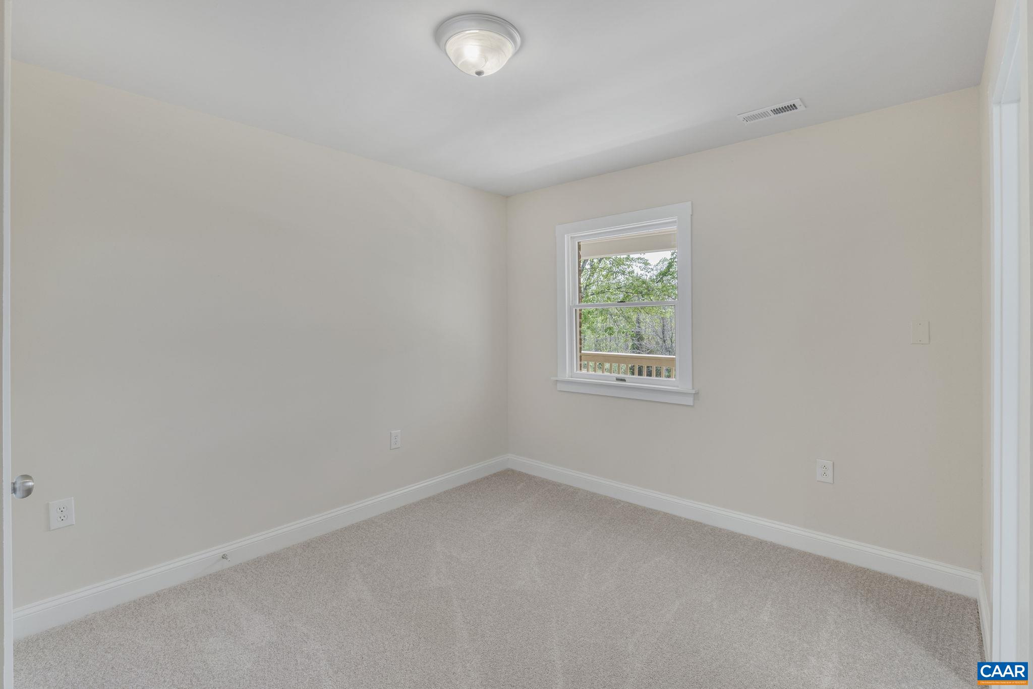 115 Montview Drive Ruckersville, VA 22968 - Photo 31 of 55 an empty room with windows