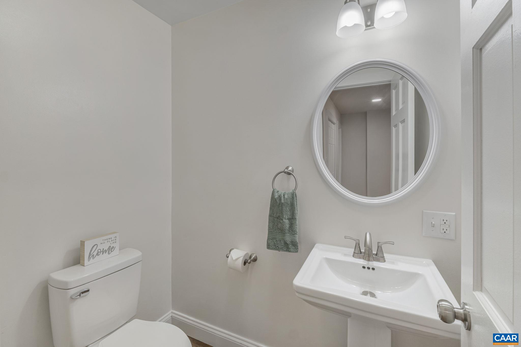 115 Montview Drive Ruckersville, VA 22968 - Photo 35 of 55 a bathroom with a sink a mirror and a toilet