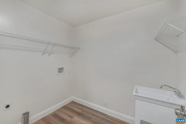 a view of a lake with a yard