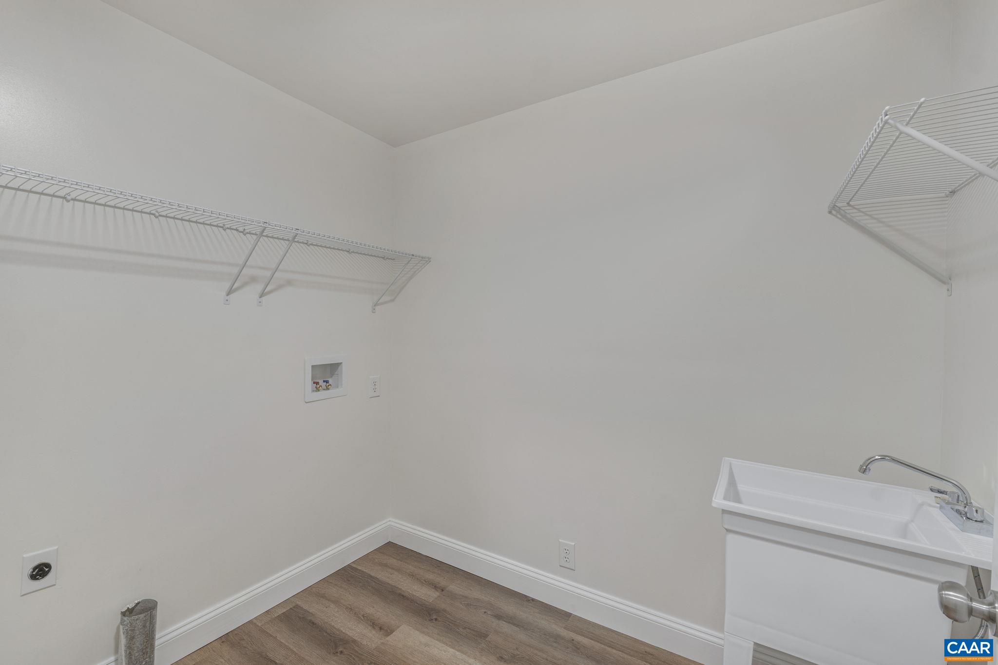 115 Montview Drive Ruckersville, VA 22968 - Photo 36 of 55 a view of a room with racks on the wall