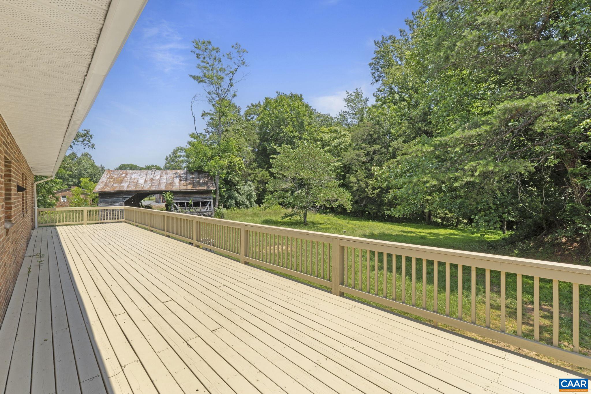 115 Montview Drive Ruckersville, VA 22968 - Photo 48 of 55 a view of balcony with wooden floor and fence