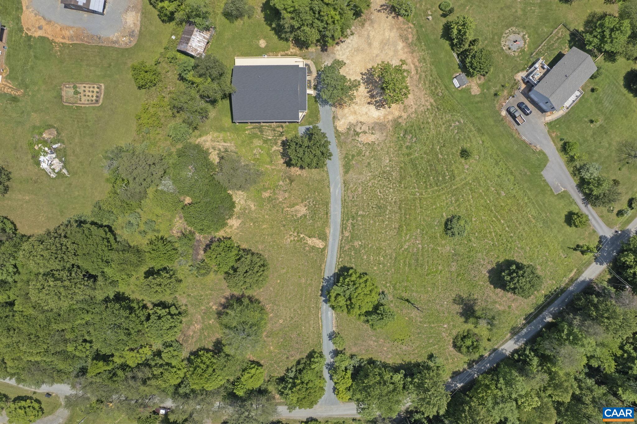 115 Montview Drive Ruckersville, VA 22968 - Photo 52 of 55 an aerial view of a house with a yard