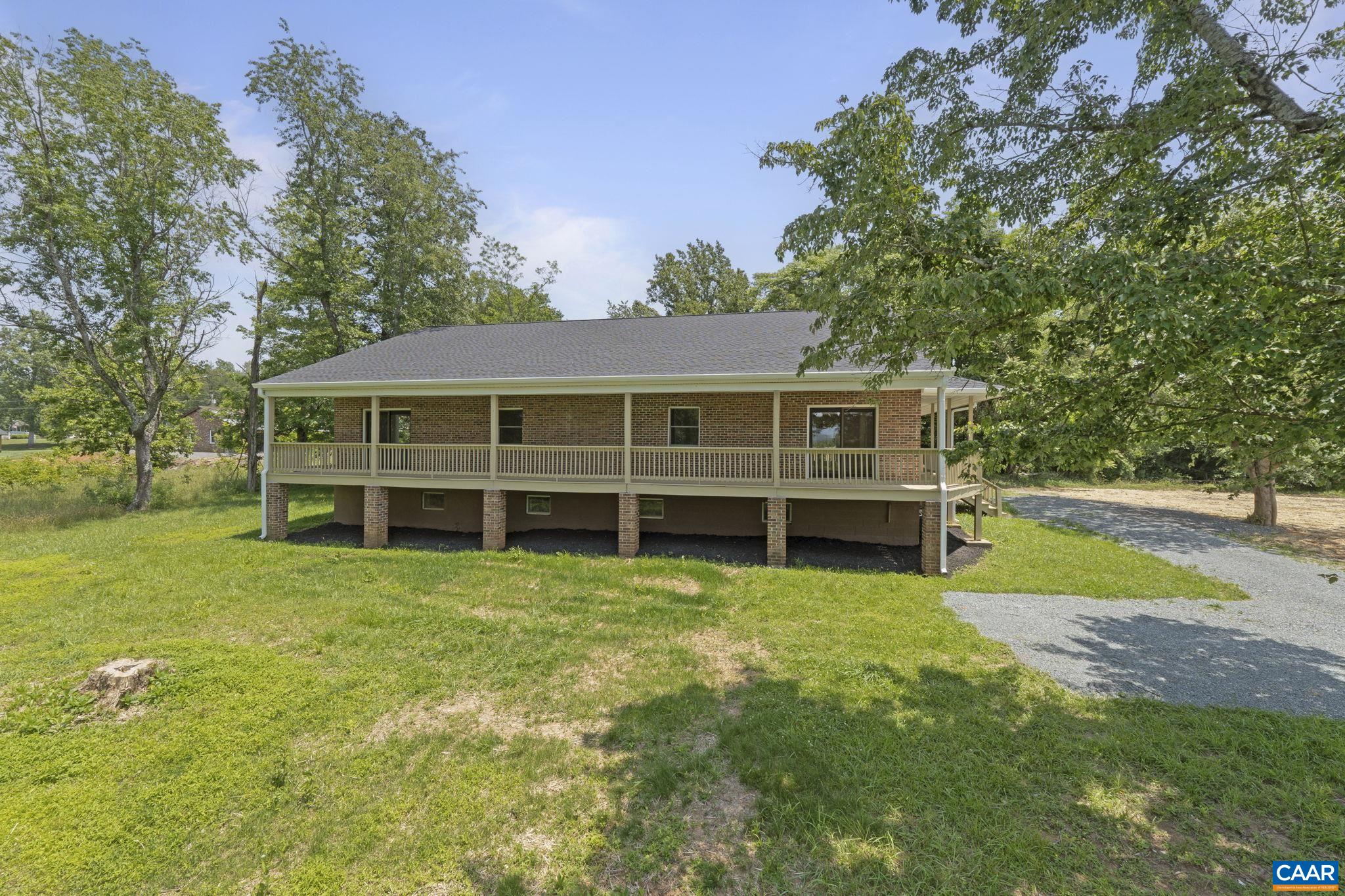 115 Montview Drive Ruckersville, VA 22968 - Photo 6 of 55 a view of a house with a yard and sitting area