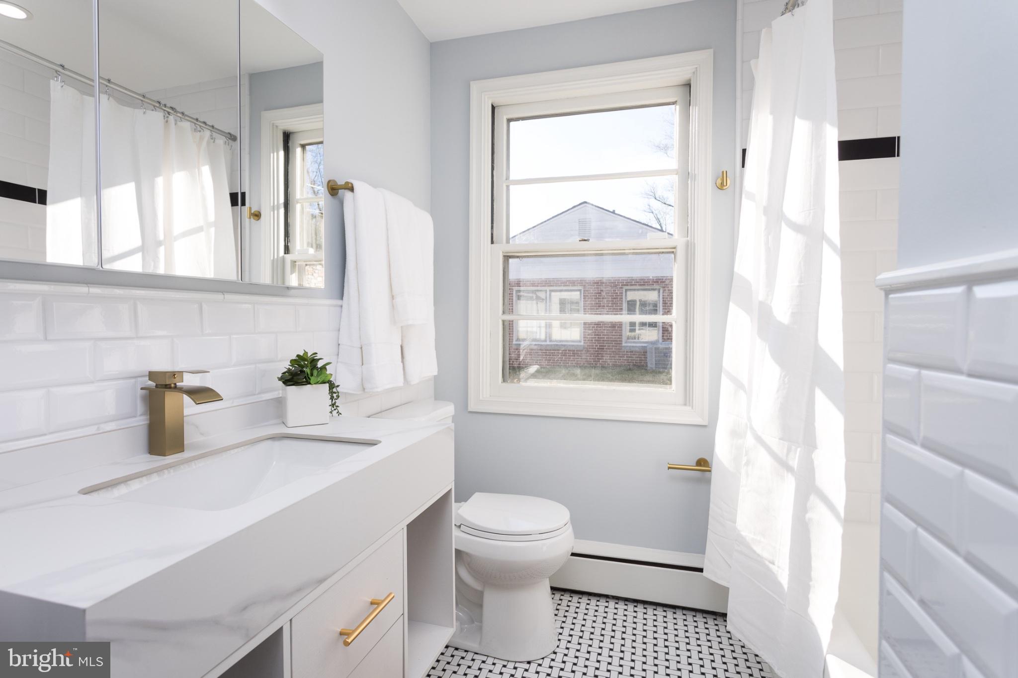 412 Aigburth Road Baltimore, MD 21286 - Photo 18 of 29 Bright and airy modern bathroom retreat.