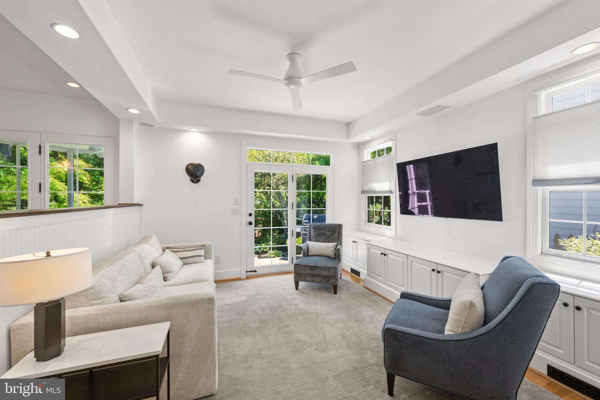 7409 Ridgewood Avenue Chevy Chase, MD 20815 - Photo 6 of 29 Family room opens to rear patio