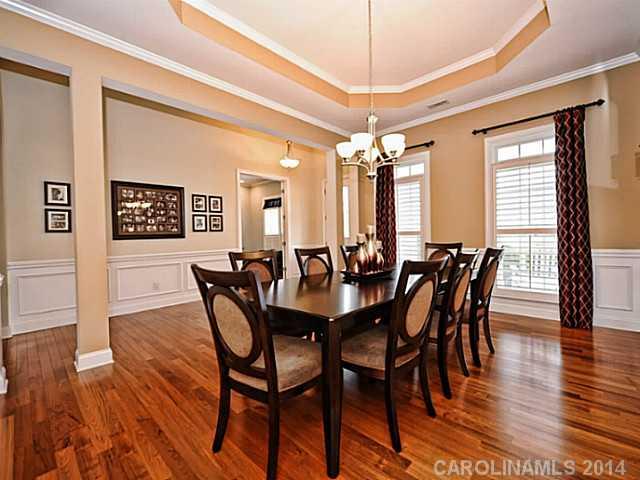 342 Miners Cove Way Fort Mill, SC 29708 - Photo 2 of 16 a view of a a dining room with furniture window and wooden floor
