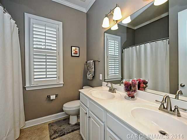 342 Miners Cove Way Fort Mill, SC 29708 - Photo 14 of 16 a bathroom with a sink toilet and a mirror