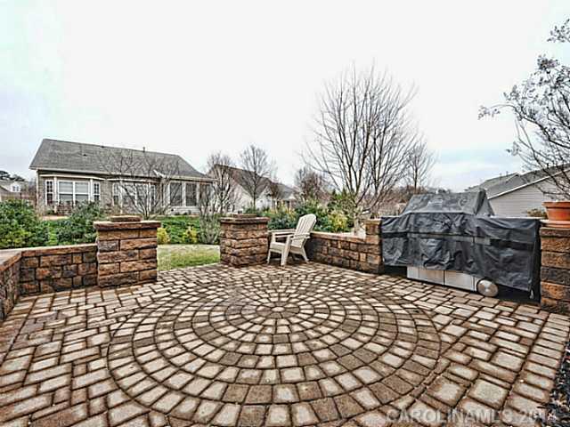 342 Miners Cove Way Fort Mill, SC 29708 - Photo 16 of 16 a view of a chairs and table on the terrace