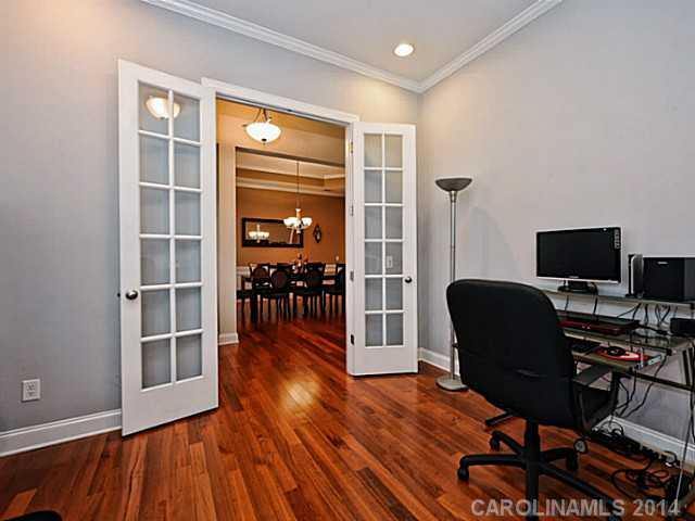 342 Miners Cove Way Fort Mill, SC 29708 - Photo 3 of 16 a view of a workspace with furniture and a window