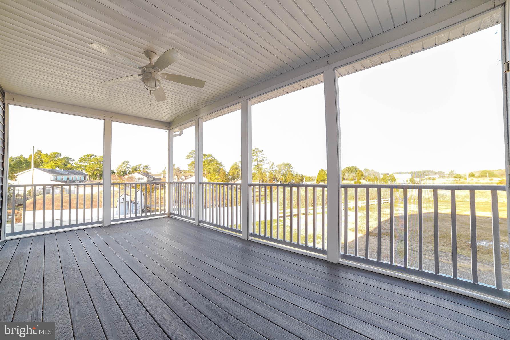 45230 Lighthouse Road Piney Point, MD 20674 - Photo 20 of 69 Enjoy a cozy meal off the kitchen on screen porch