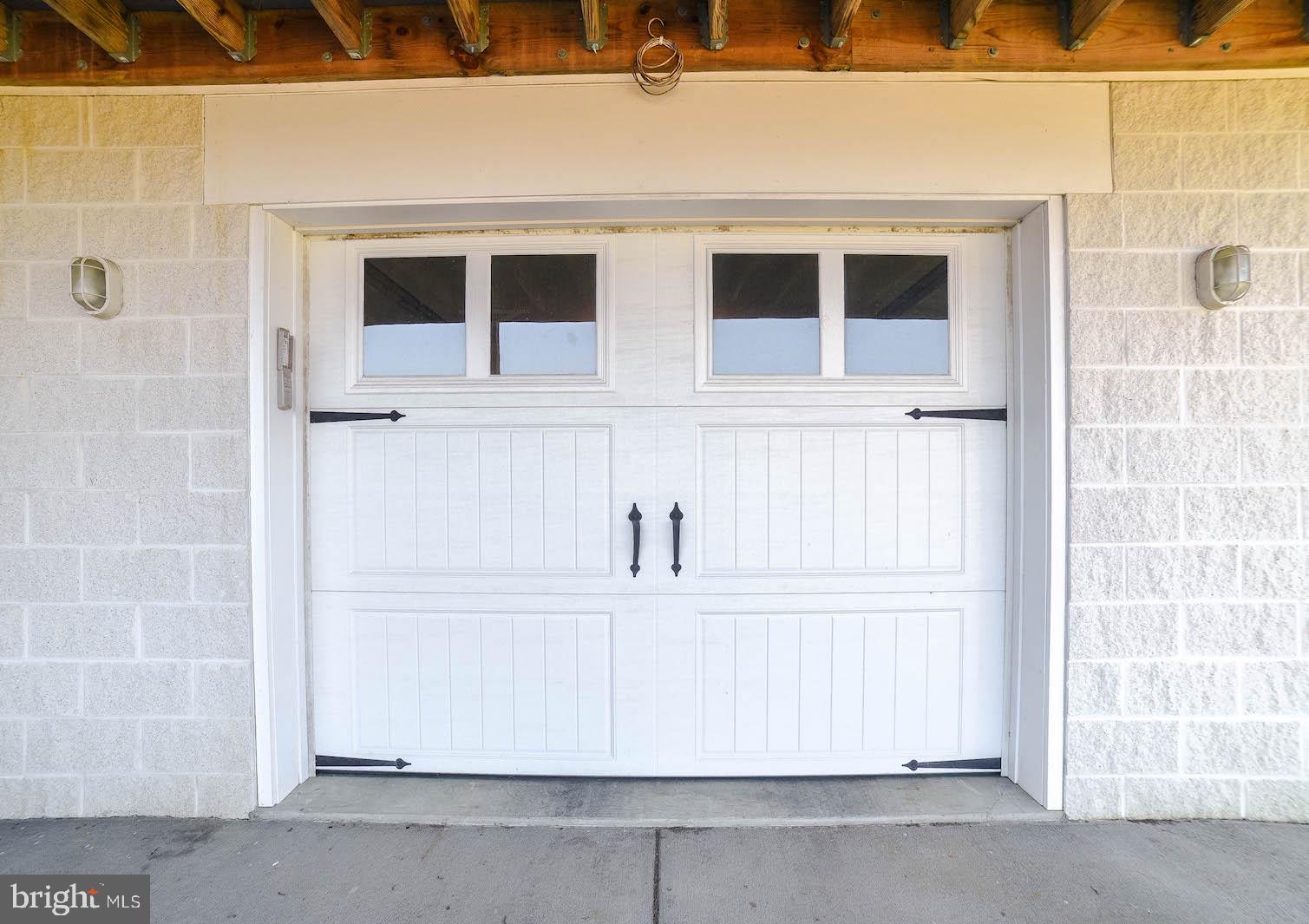 45230 Lighthouse Road Piney Point, MD 20674 - Photo 63 of 69 Rear load garage door