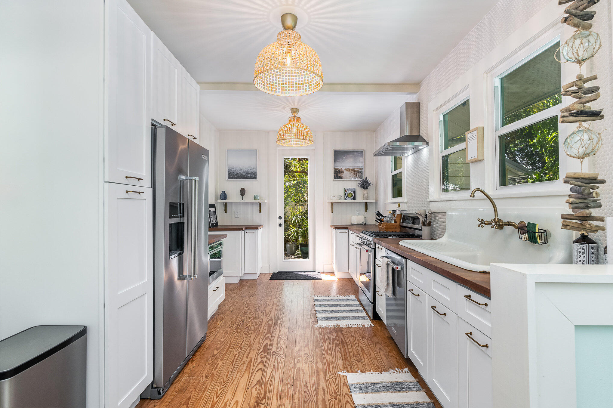 703 Shady Lane Melbourne, FL 32935 - Photo 13 of 23 a large kitchen with a lot of counter space