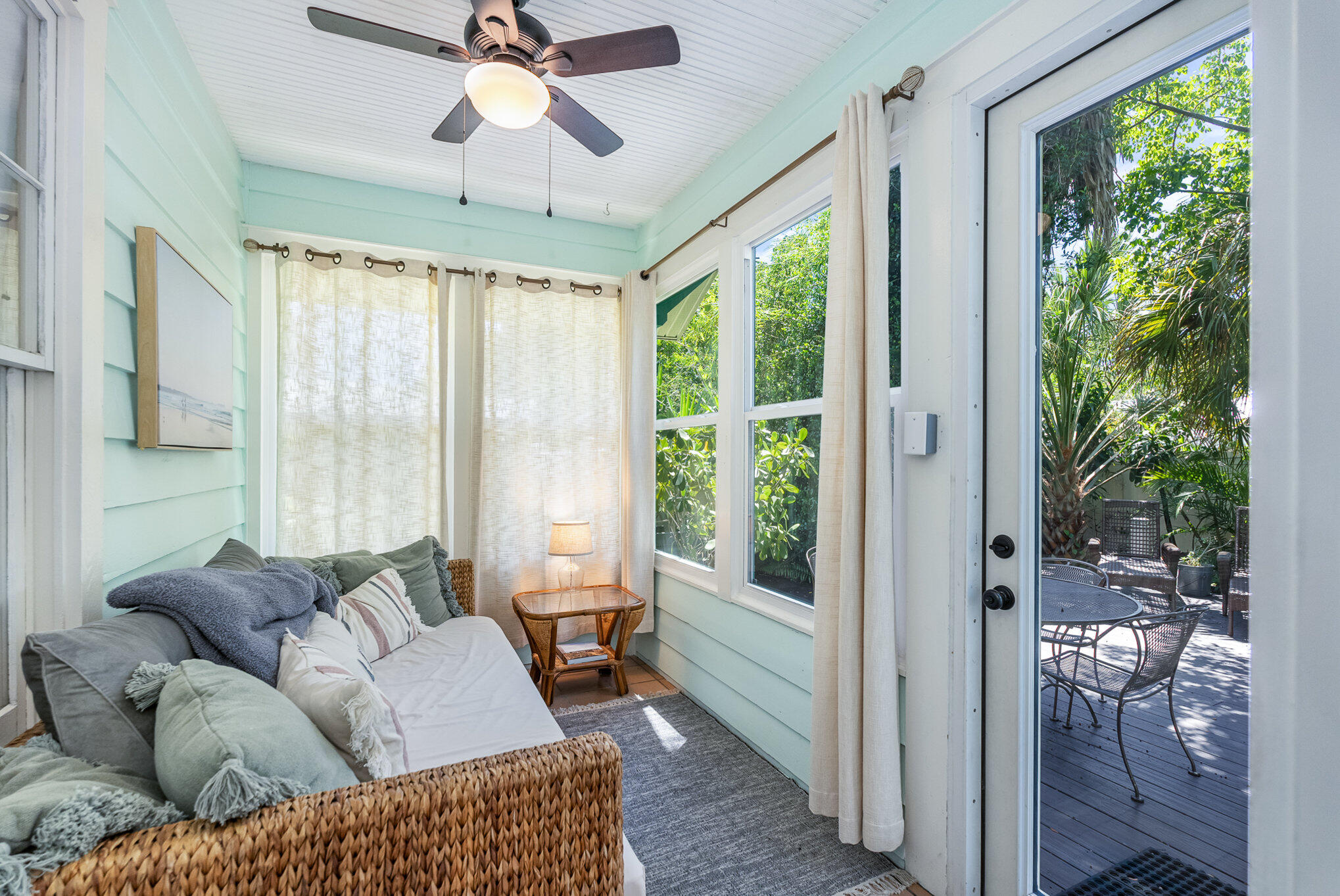 703 Shady Lane Melbourne, FL 32935 - Photo 18 of 23 a living room with furniture and a large window