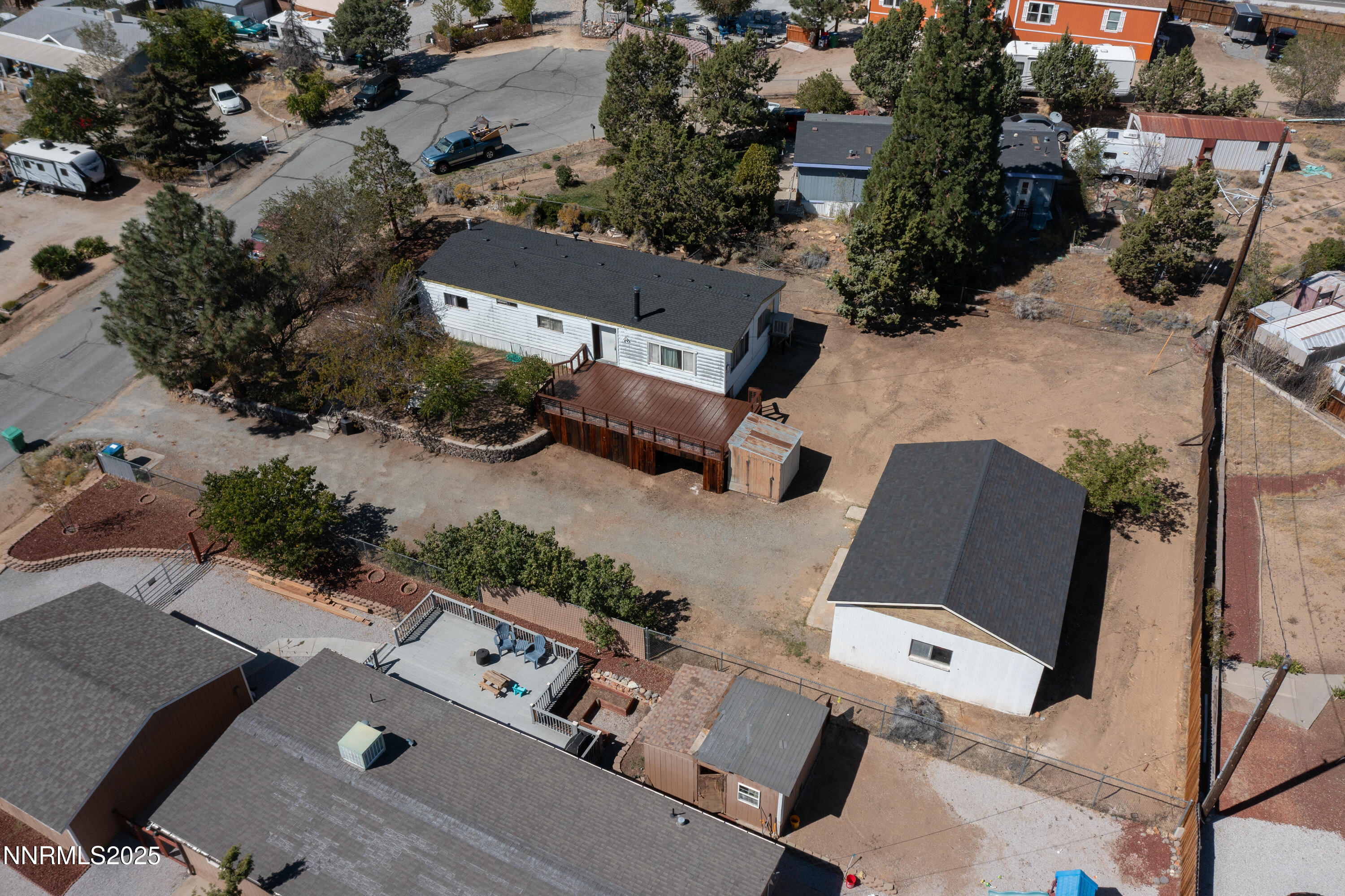 an aerial view of a house with outdoor space