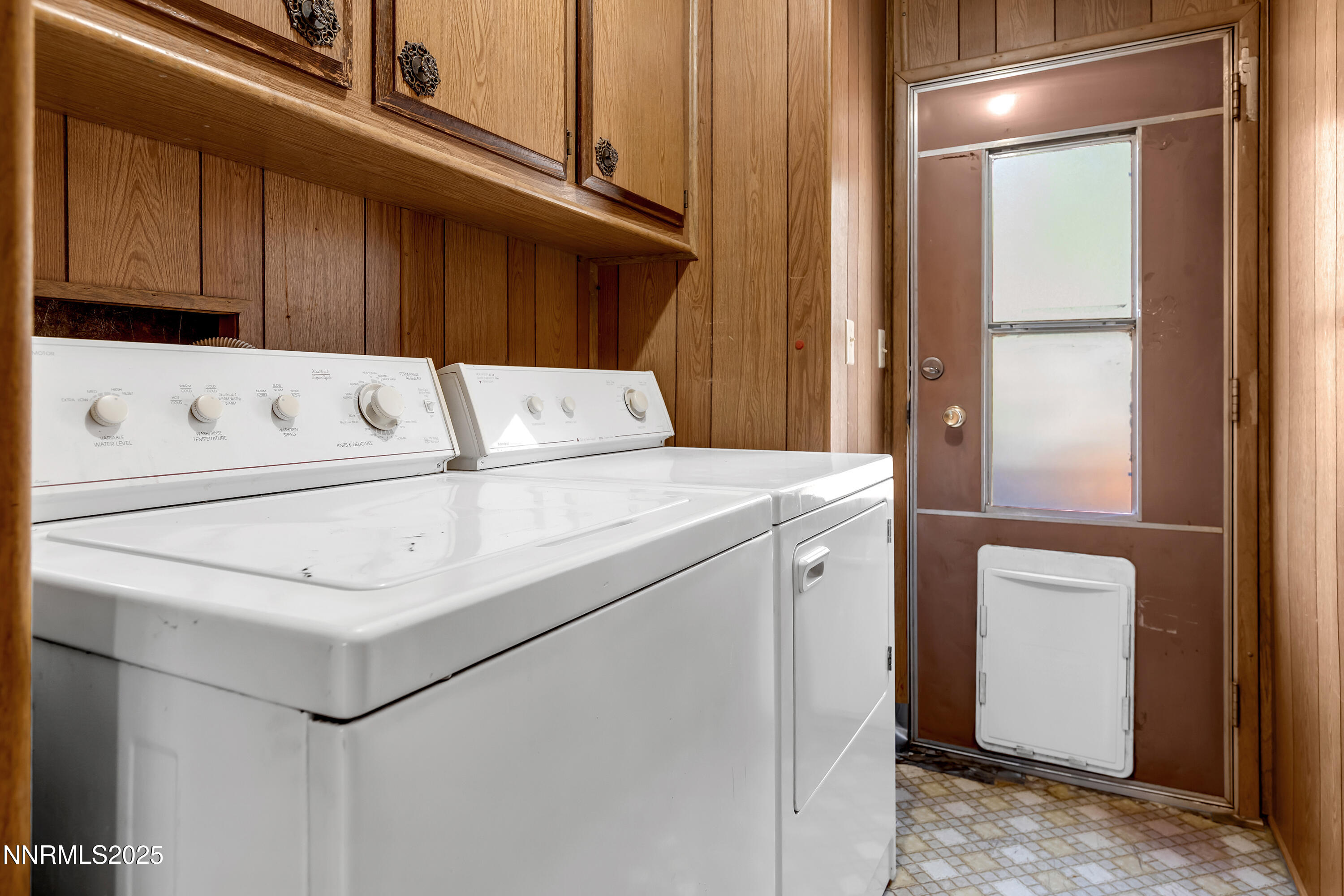 5961 Spring Valley Circle Sun Valley, NV 89433 - Photo 13 of 20 a utility room with dryer and washer