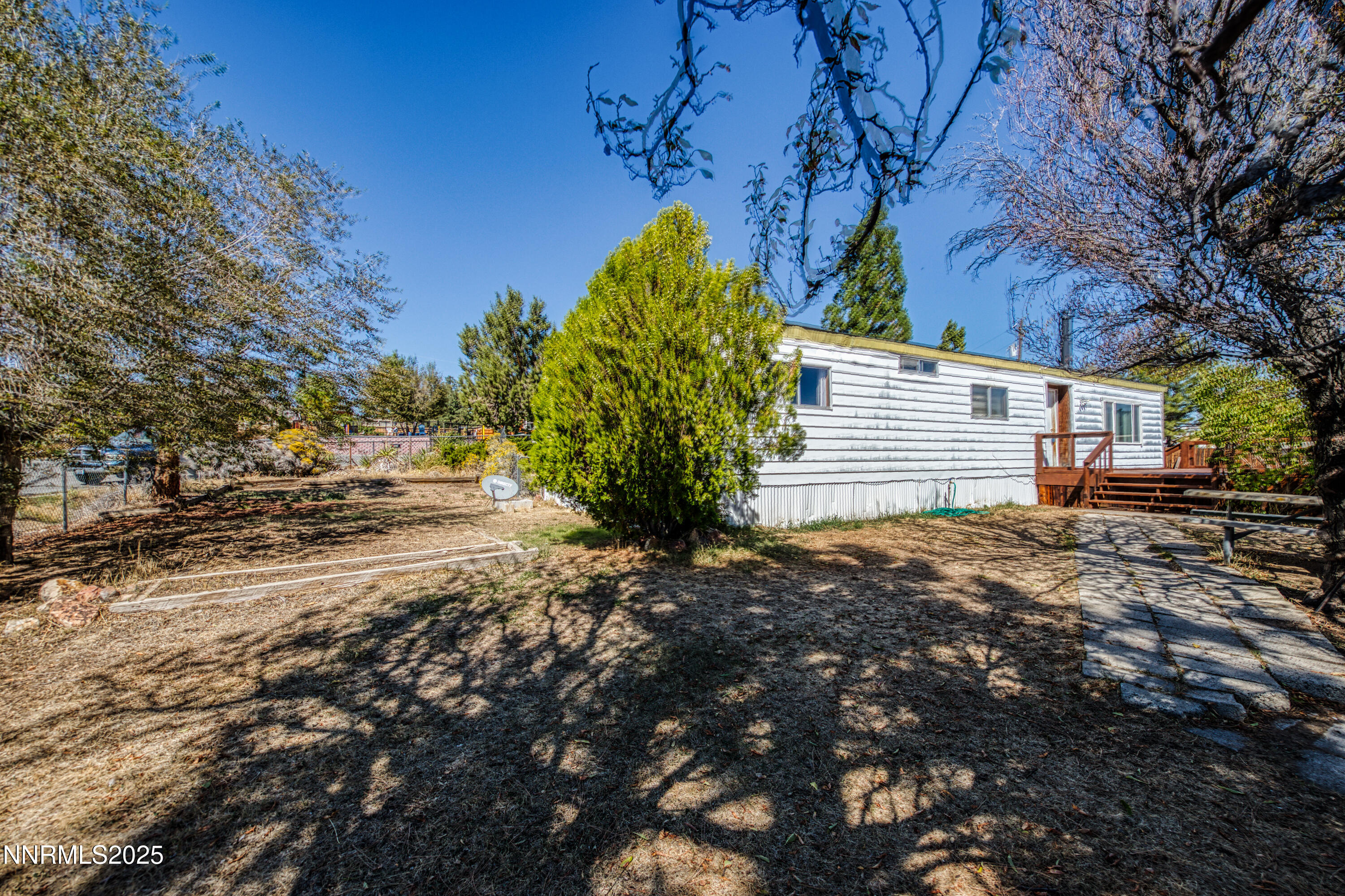 5961 Spring Valley Circle Sun Valley, NV 89433 - Photo 17 of 20 a view of outdoor space and yard
