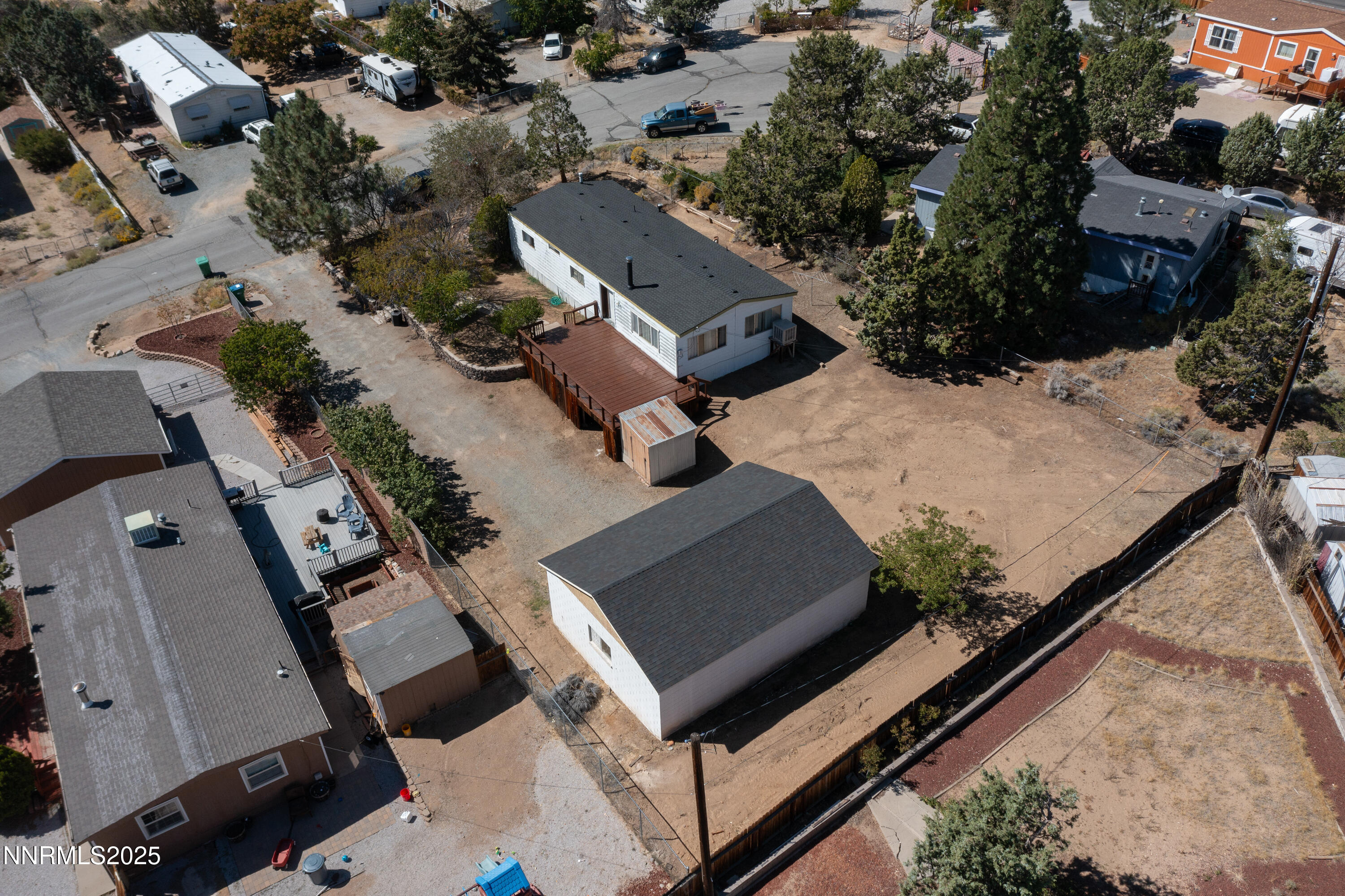 5961 Spring Valley Circle Sun Valley, NV 89433 - Photo 19 of 20 an aerial view of a residential apartment building with a yard