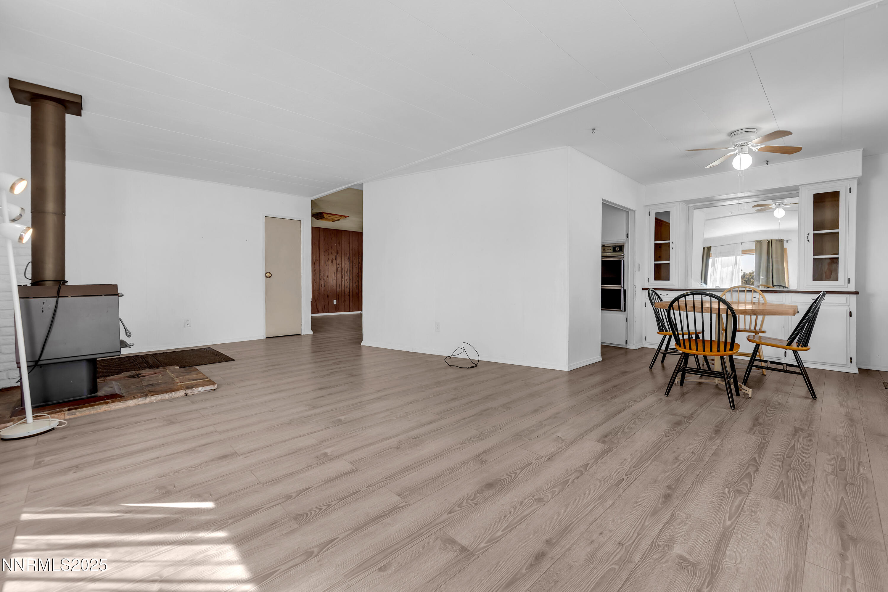 5961 Spring Valley Circle Sun Valley, NV 89433 - Photo 3 of 20 a view of a livingroom with furniture and lounge chair