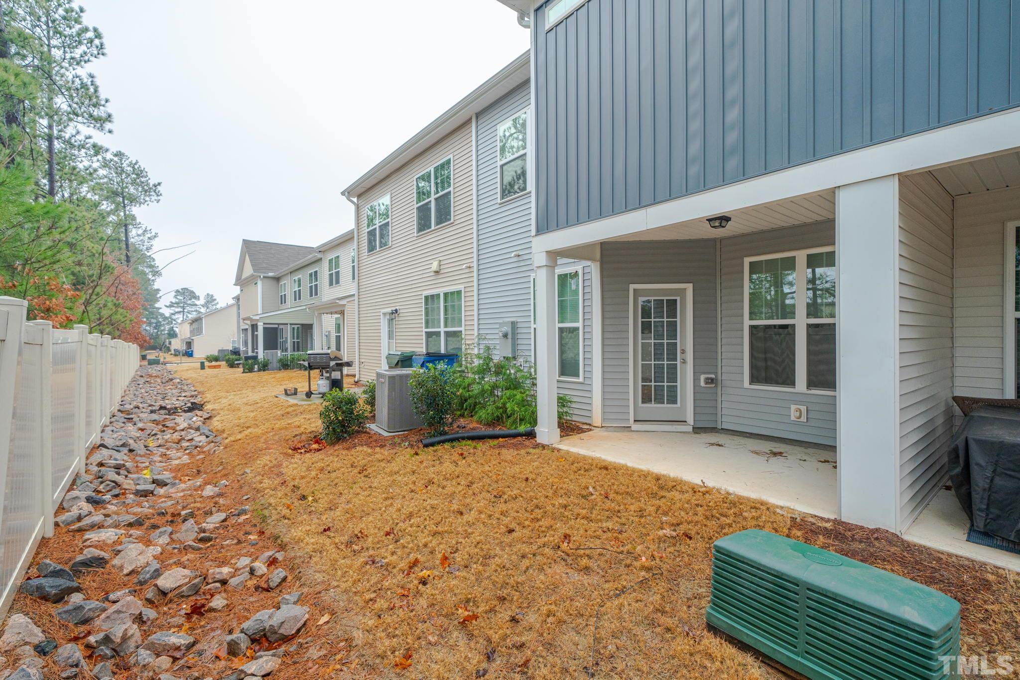 6075 Beale Loop Raleigh, NC 27616 - Photo 23 of 23 a view of a house with backyard and sitting area