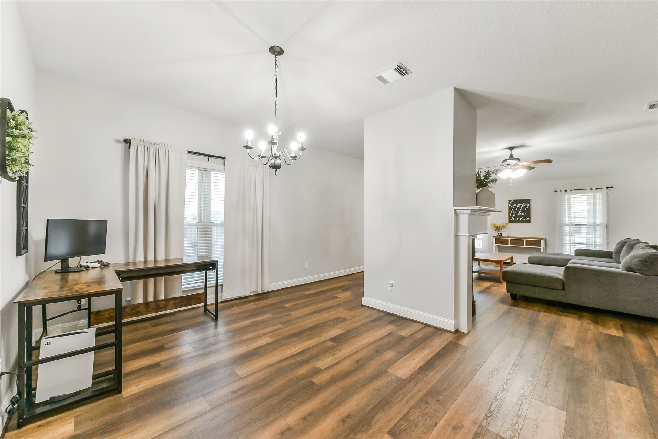 4010 Spring Branch Drive West Pearland, TX 77584 - Photo 19 of 35 a view of a livingroom with furniture and wooden floor