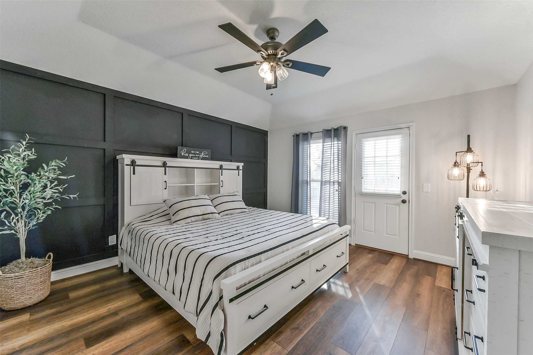 4010 Spring Branch Drive West Pearland, TX 77584 - Photo 20 of 35 a bedroom with a bed and ceiling fan