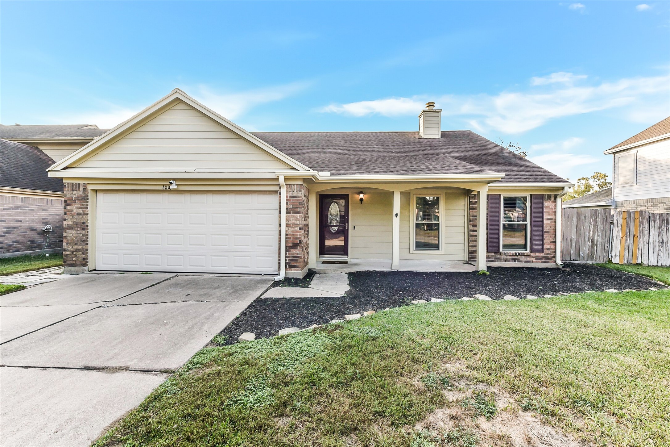 4010 Spring Branch Drive West Pearland, TX 77584 - Photo 3 of 35 a view of a yard in front of a house with a yard