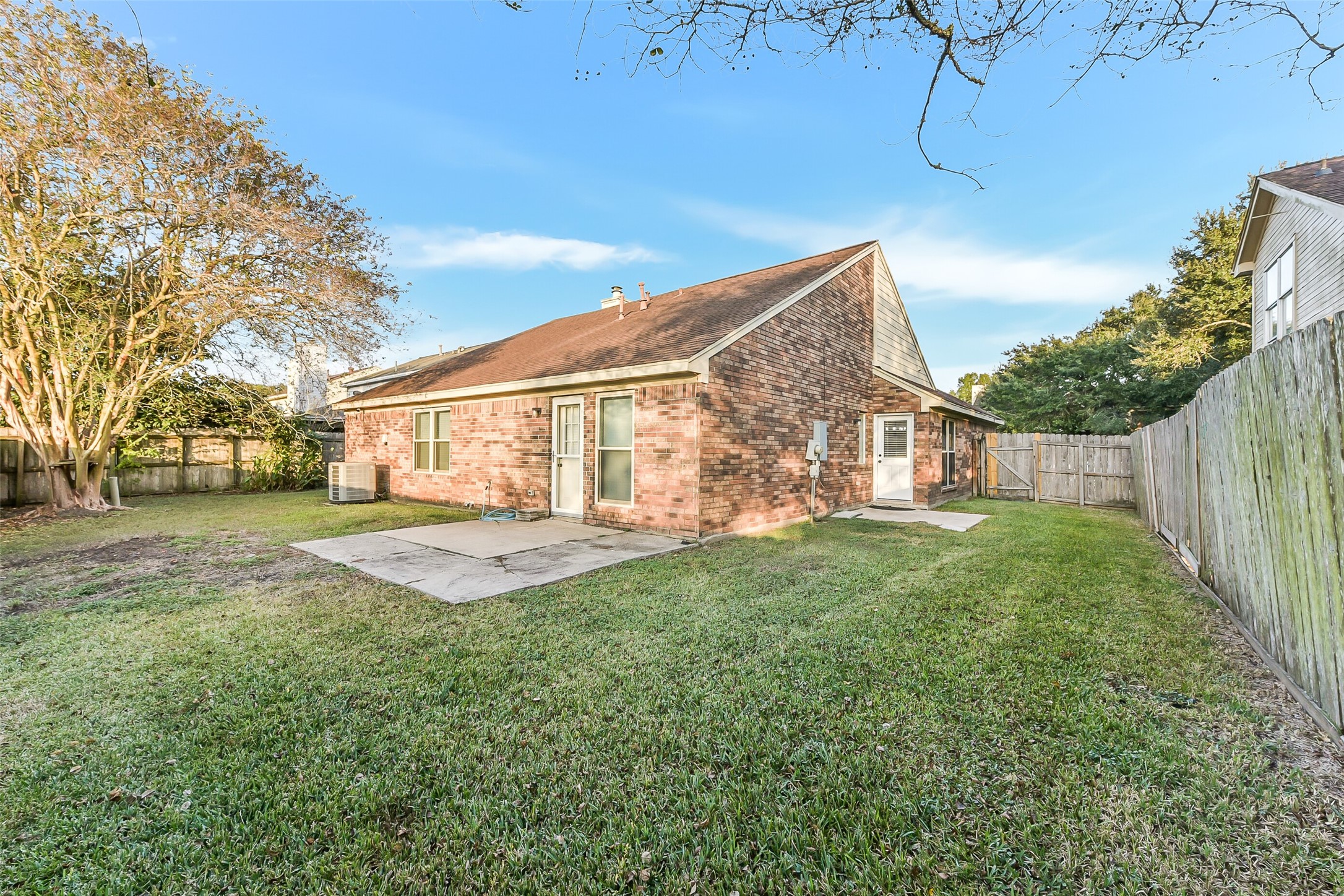 4010 Spring Branch Drive West Pearland, TX 77584 - Photo 32 of 35 a view of a house with backyard and sitting area