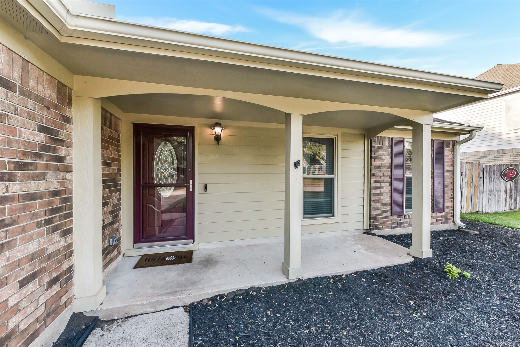 4010 Spring Branch Drive West Pearland, TX 77584 - Photo 4 of 35 a view of a hallway with wooden door