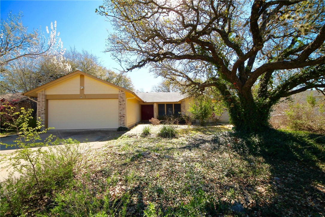 1804 Hatch Road Cedar Park, TX 78613 - Photo 1 of 1 a front view of a house with a yard