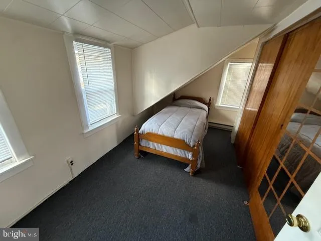 a room with window and stairs