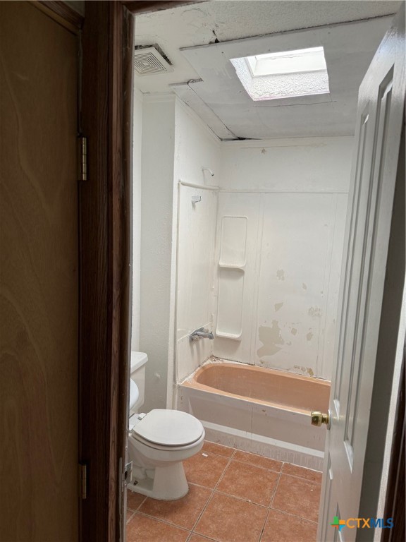 10080 Rebecca Creek Road Spring Branch, TX 78070 - Photo 11 of 16 a bathroom with a toilet and a bathtub