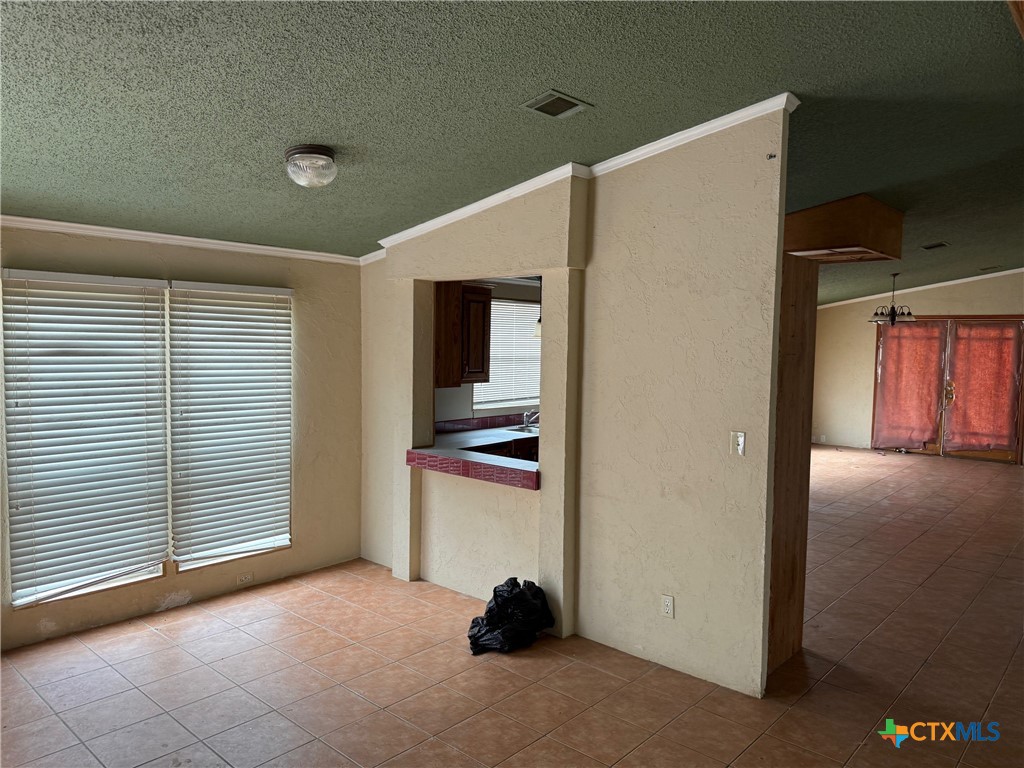 10080 Rebecca Creek Road Spring Branch, TX 78070 - Photo 12 of 16 a view of a livingroom with a staircase