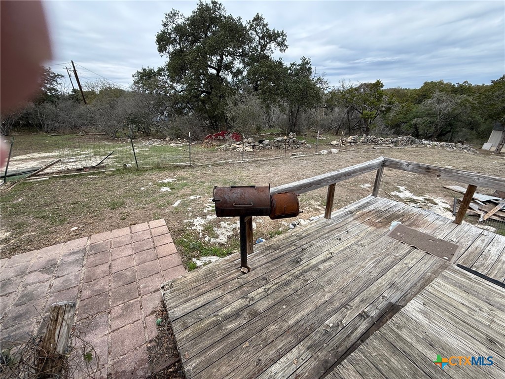 10080 Rebecca Creek Road Spring Branch, TX 78070 - Photo 16 of 16 a view of a terrace with sitting area