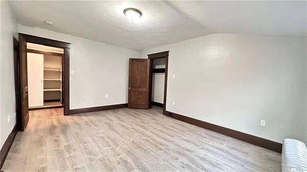 an empty room with closet