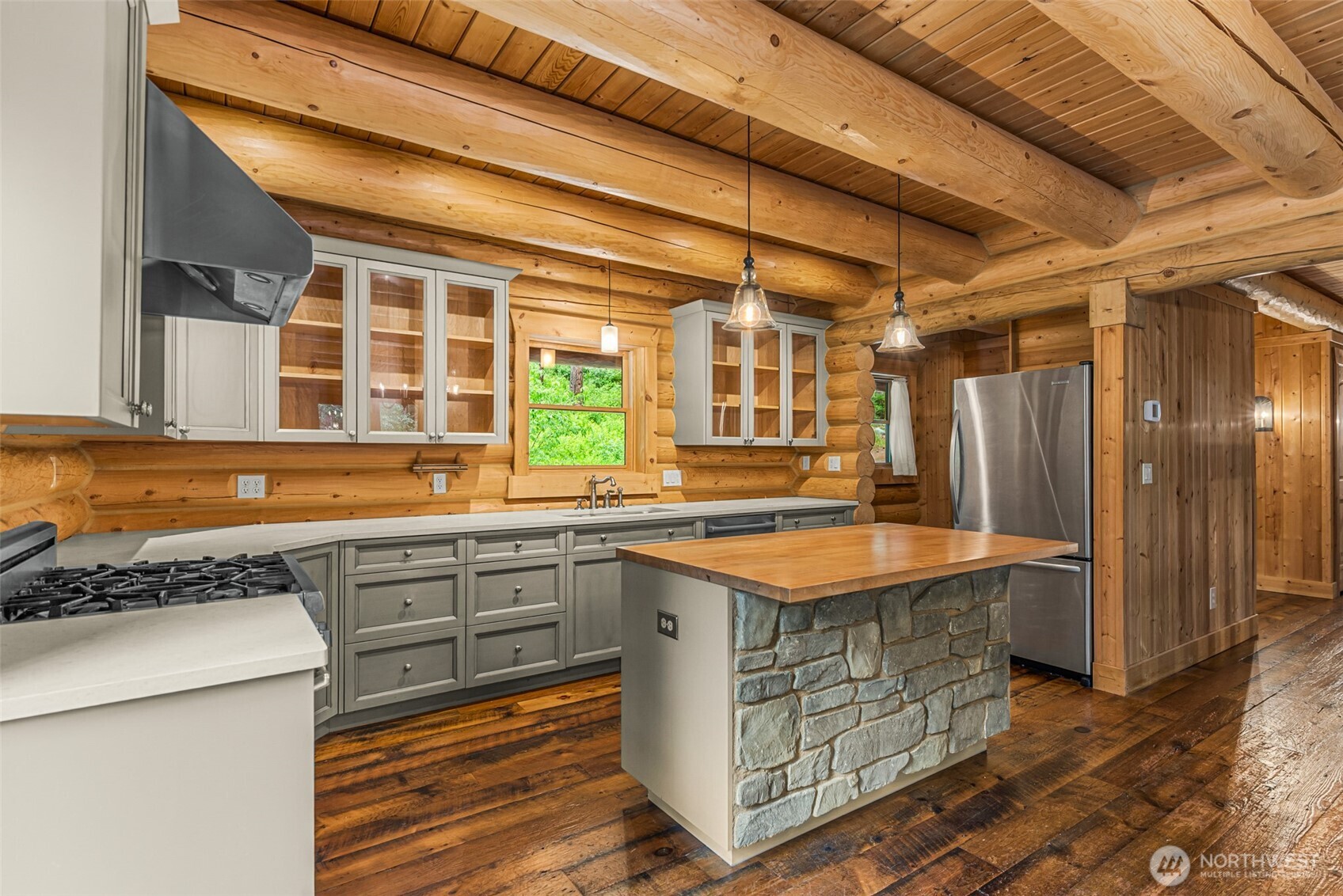 3888 Camas Creek Road Peshastin, WA 98847 - Photo 6 of 40 a kitchen with a stove a sink and a refrigerator