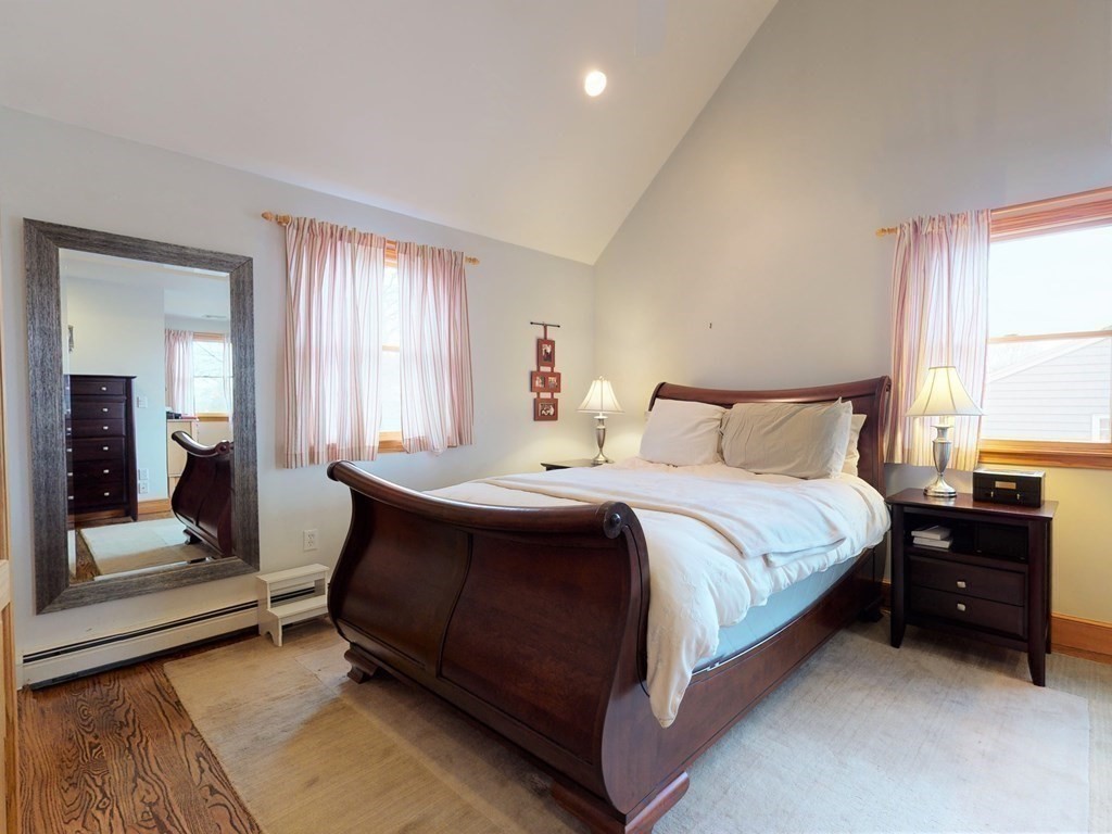 26 Grosvenor Road Waltham, MA 02453 - Photo 16 of 35 a bedroom with a bed and window