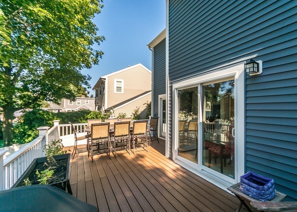 26 Grosvenor Road Waltham, MA 02453 - Photo 28 of 35 a view of a chairs on the deck