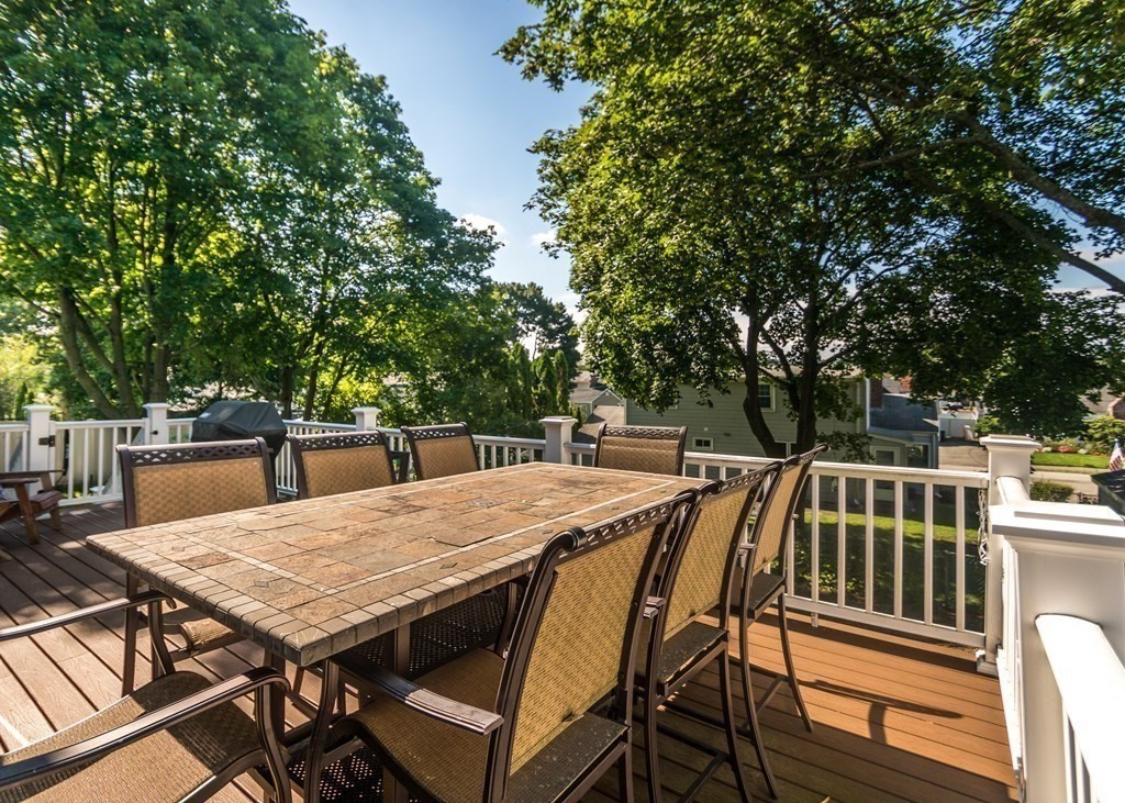 26 Grosvenor Road Waltham, MA 02453 - Photo 29 of 35 a view of a dinning table and chairs in patio