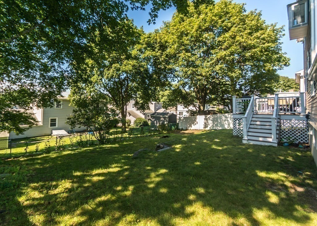 26 Grosvenor Road Waltham, MA 02453 - Photo 32 of 35 a view of yard with green space