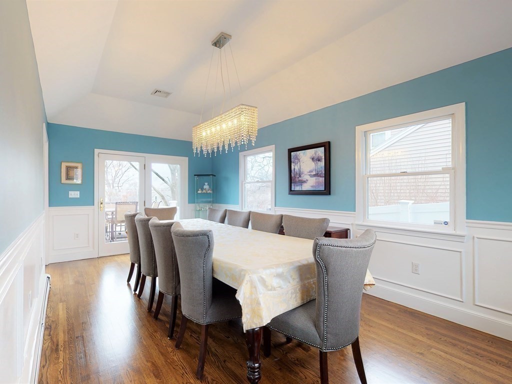 26 Grosvenor Road Waltham, MA 02453 - Photo 9 of 35 a view of a dining room with furniture and wooden floor