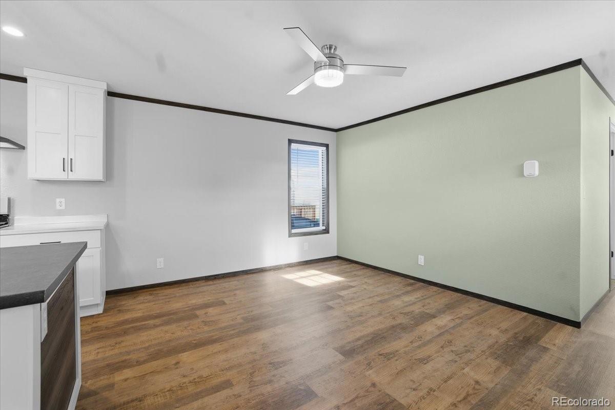 230 North 2nd Berthoud, CO 80513 - Photo 4 of 21 a view of an empty room with a sink and a window