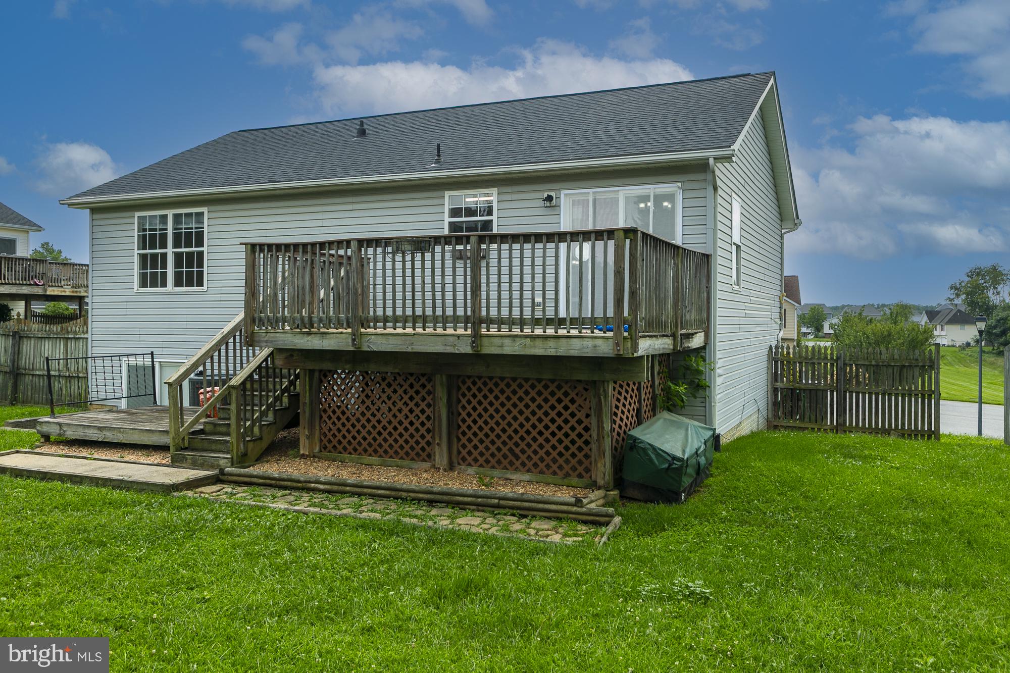 28 Roger Court Ranson, WV 25438 - Photo 32 of 33 Charming home with spacious deck.