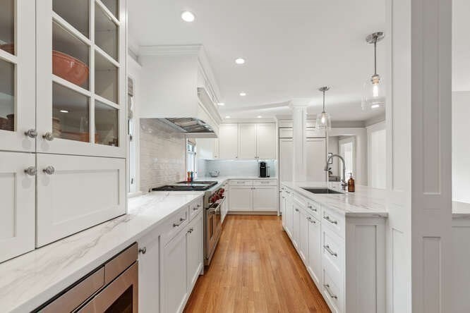 6 Hayes Avenue Lexington, MA 02420 - Photo 11 of 34 a large kitchen with a lot of counter space