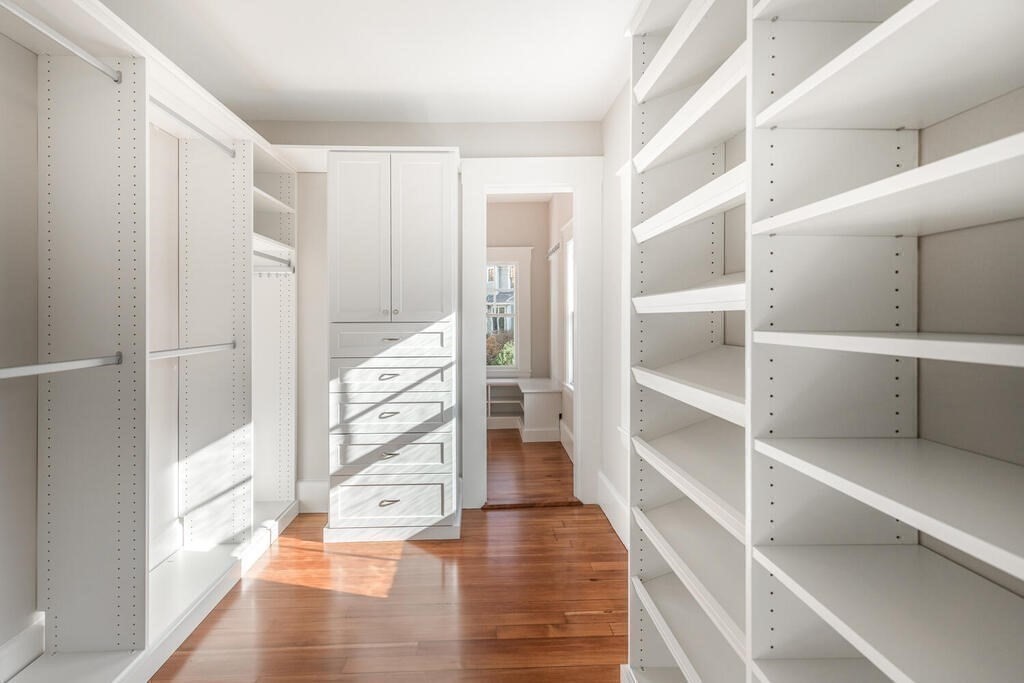 6 Hayes Avenue Lexington, MA 02420 - Photo 18 of 34 a view of walk in closet with empty racks