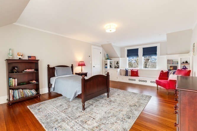 6 Hayes Avenue Lexington, MA 02420 - Photo 27 of 34 a living room with furniture and a wooden floor