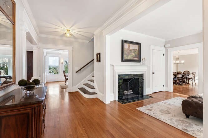 6 Hayes Avenue Lexington, MA 02420 - Photo 4 of 34 a living room with furniture and a fireplace