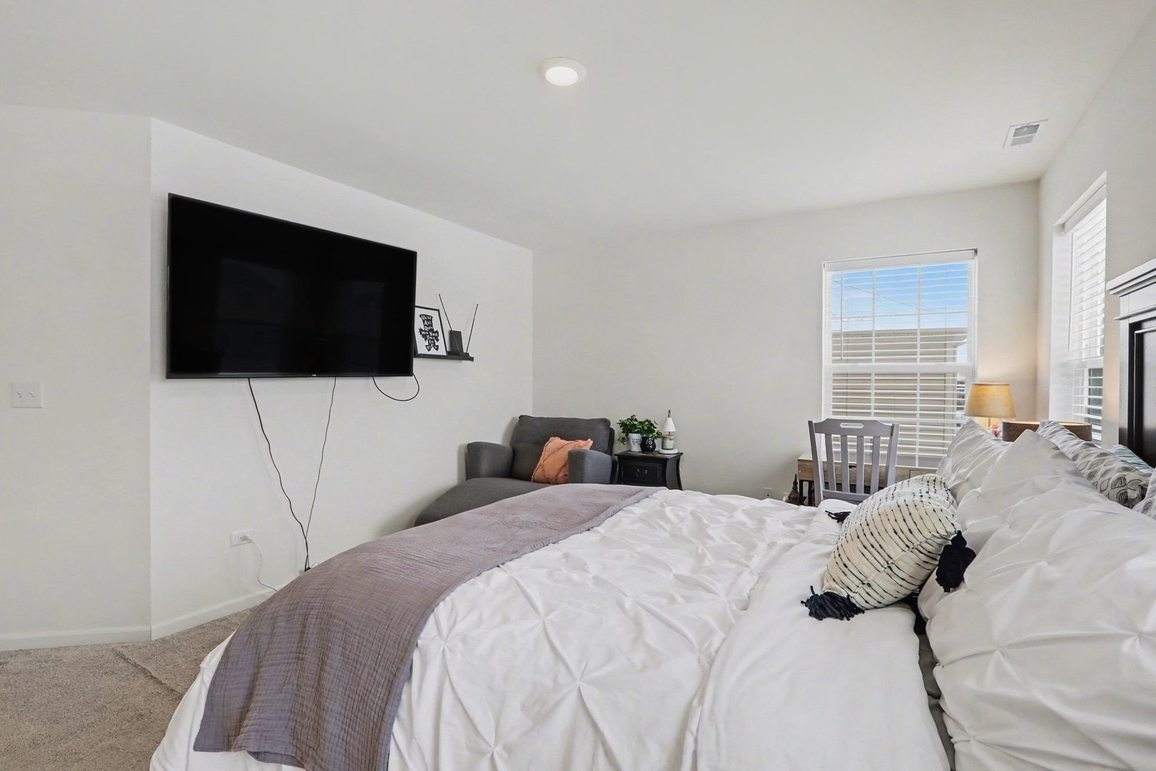 24754 McCormick Way Manhattan, IL 60442 - Photo 8 of 15 a bedroom with a bed and a flat screen tv
