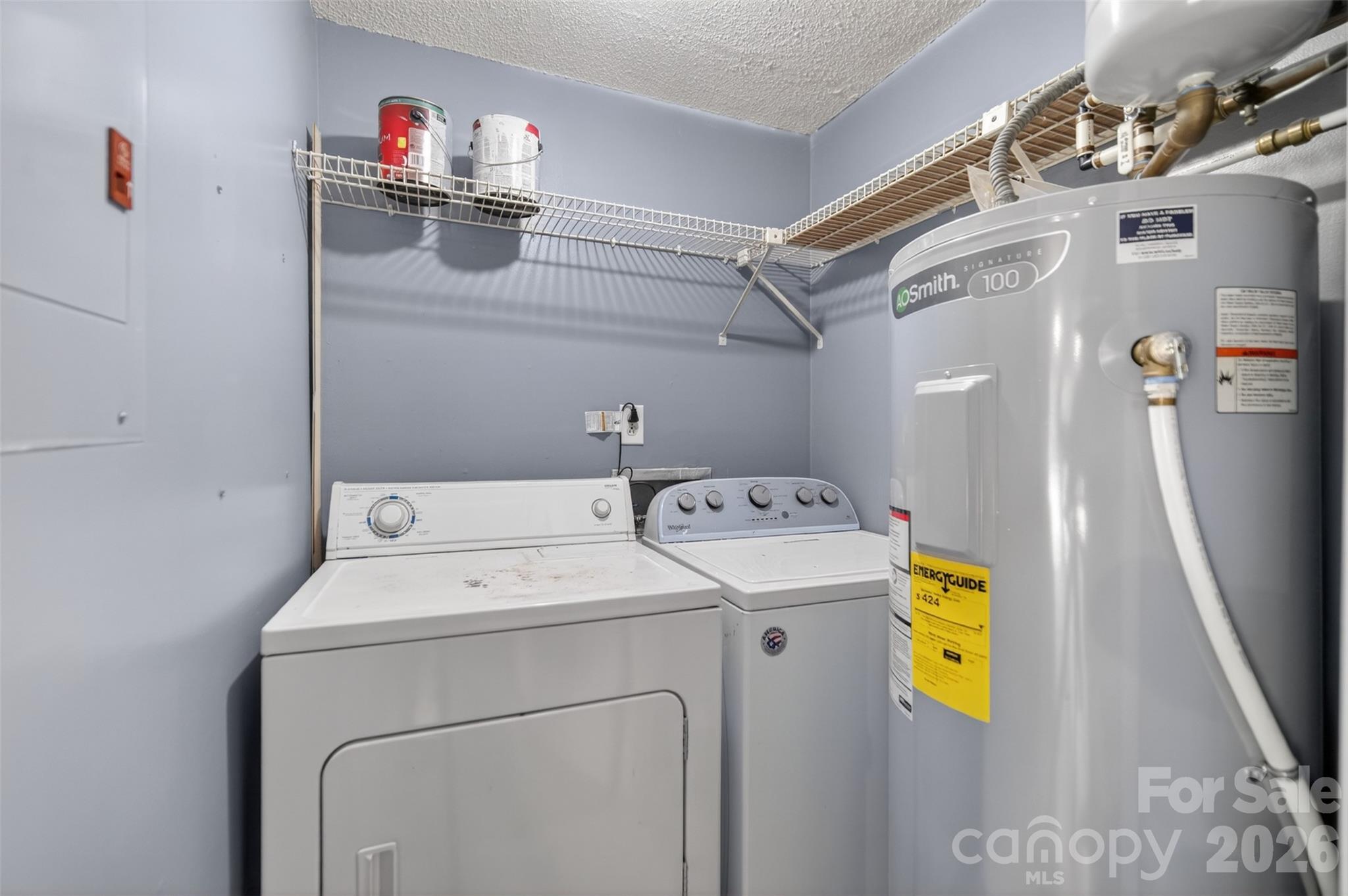 9405 Old Concord Road, Unit C Charlotte, NC 28213 - Photo 12 of 27 a utility room with dryer and washer